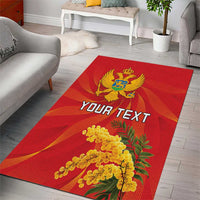 Red personalized area rug showing Montenegro coat of arms, YOUR TEXT, and mimoza flowers
