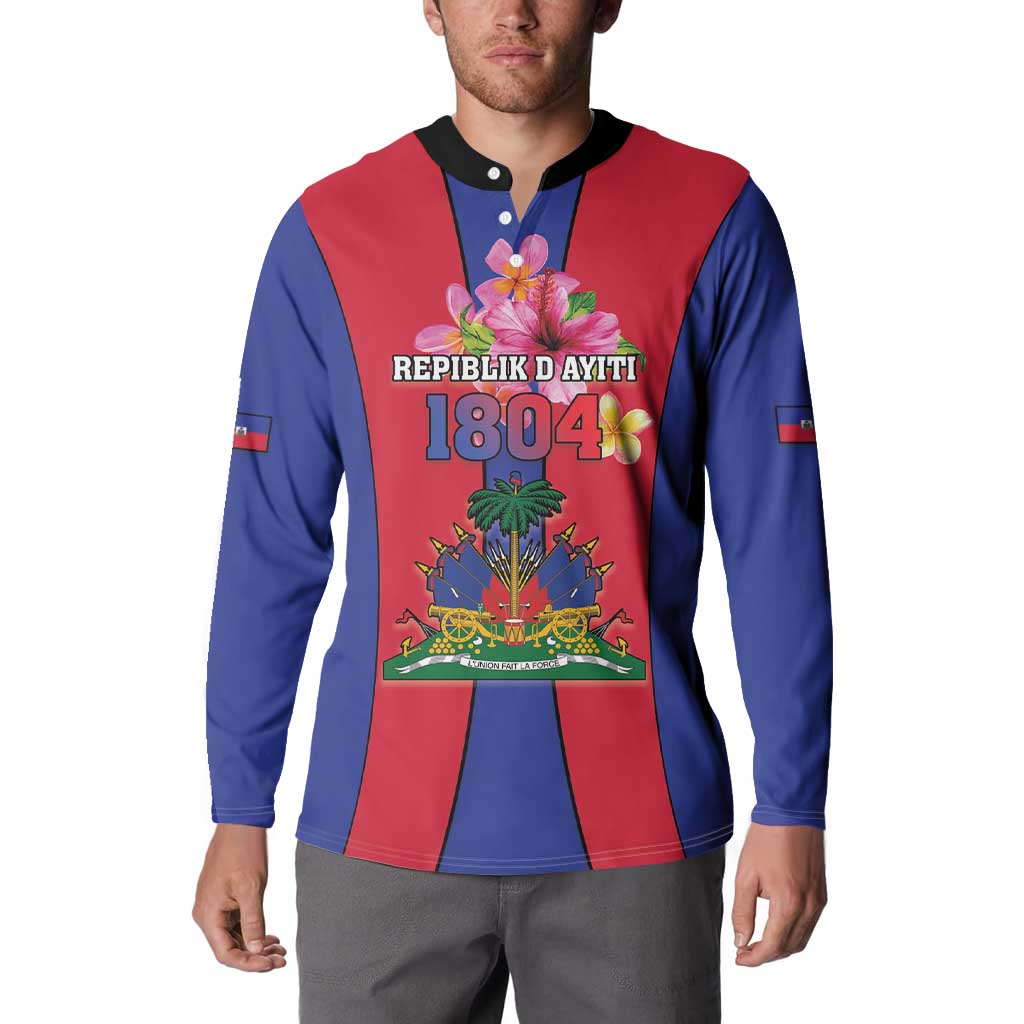Blue and red button sweatshirt with Haiti coat of arms front graphic and black collar.