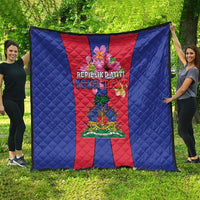 Haiti flag quilt spread out, blue border with red center panel and coat of arms crest