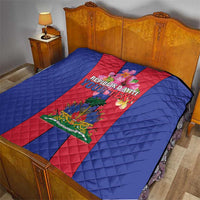 Haiti flag quilt on bed: blue surround, red middle panel with coat of arms