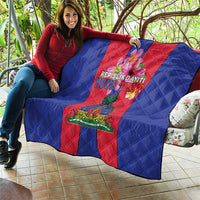 Haiti flag coat of arms quilt in blue and red, draped as a throw with crest