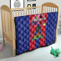 Haiti flag quilt on crib, blue quilt with red panel and coat of arms graphic