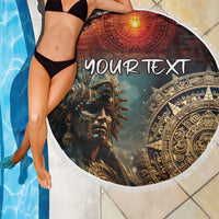 Round beach blanket with fringe showing Aztec warrior face, 'YOUR TEXT' text, circular seal.