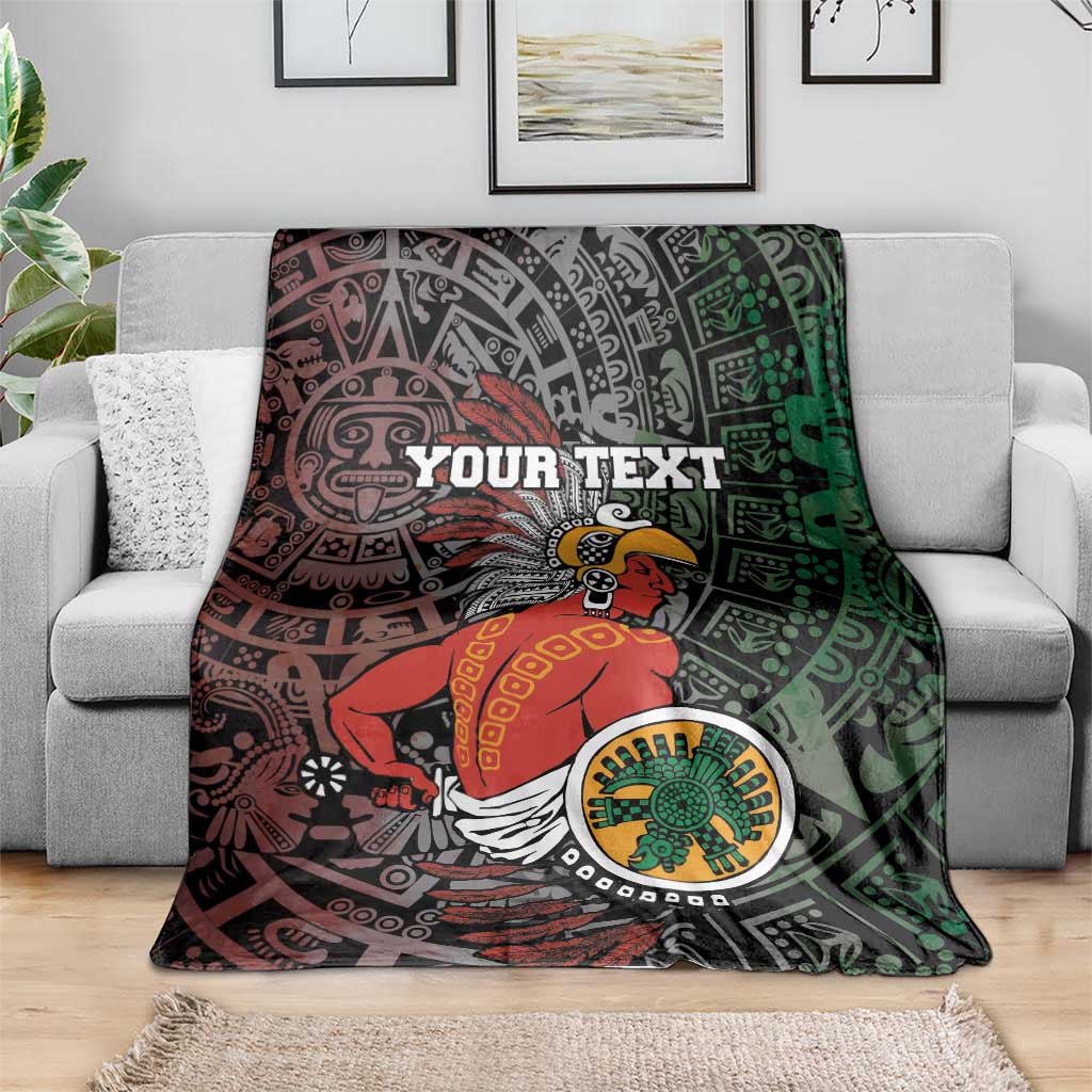 Personalized Aztec warrior blanket on sofa, Your Text over red and green tribal graphics.