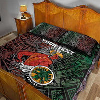 Aztec warrior quilt bed set with bold green and red tribal blocks, two matching pillows