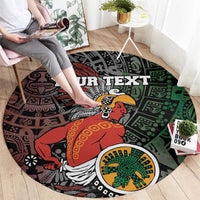 Round tribal Aztec carpet, black base with red warrior and green geometric sun medallion