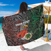 Personalized tribal sarong in black, green, and red with 'YOUR TEXT' warrior emblem