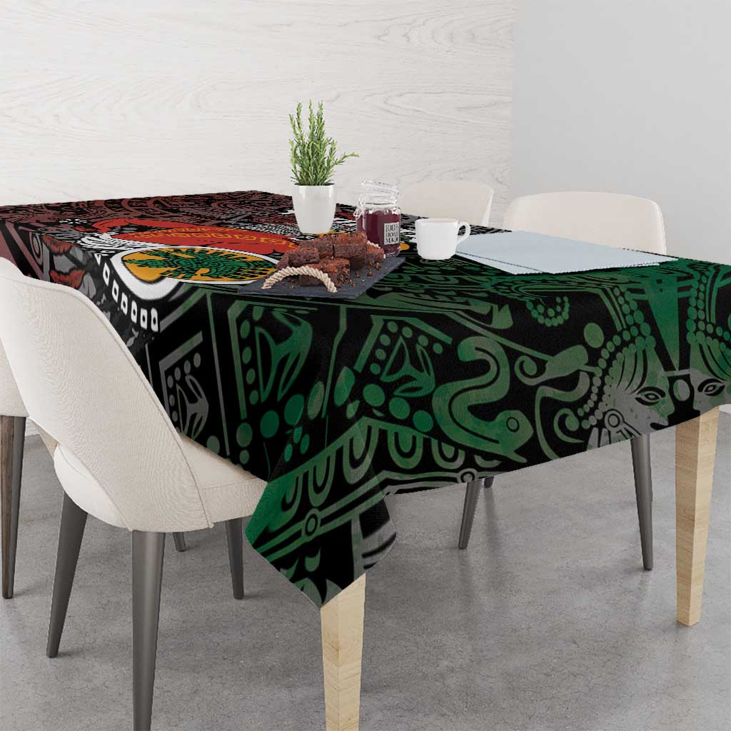 Black Aztec tablecloth with green tribal pattern and warrior sun centerpiece