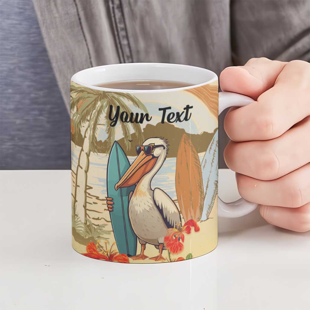 Ceramic mug with pelican graphic and "Your Text" text, held by the handle