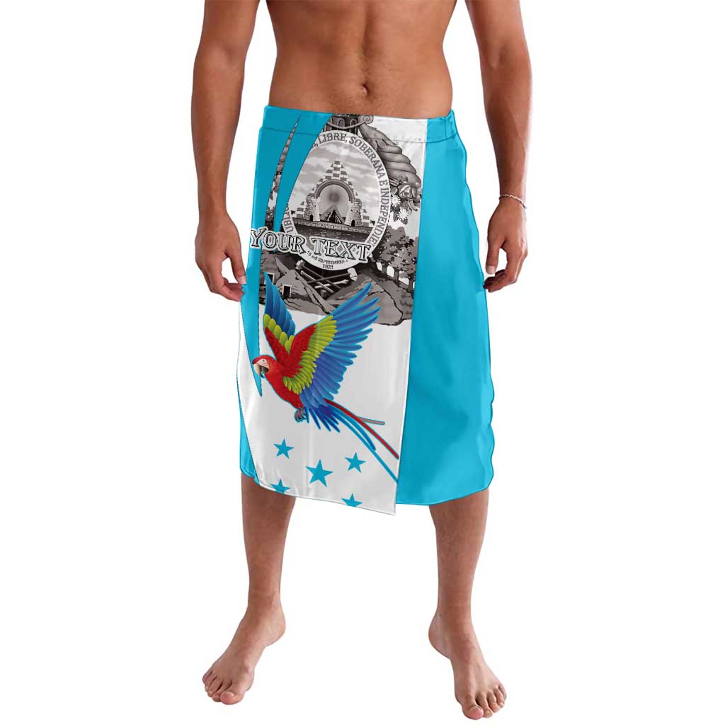 Turquoise sarong with white graphic panel, colorful macaw and coat of arms print