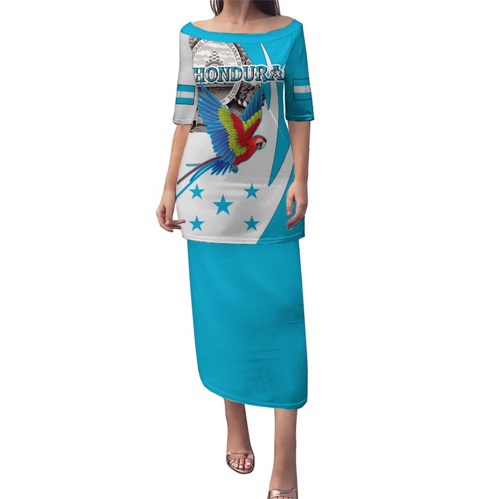 Women’s long turquoise dress with white panel, macaw and Honduras coat of arms graphic