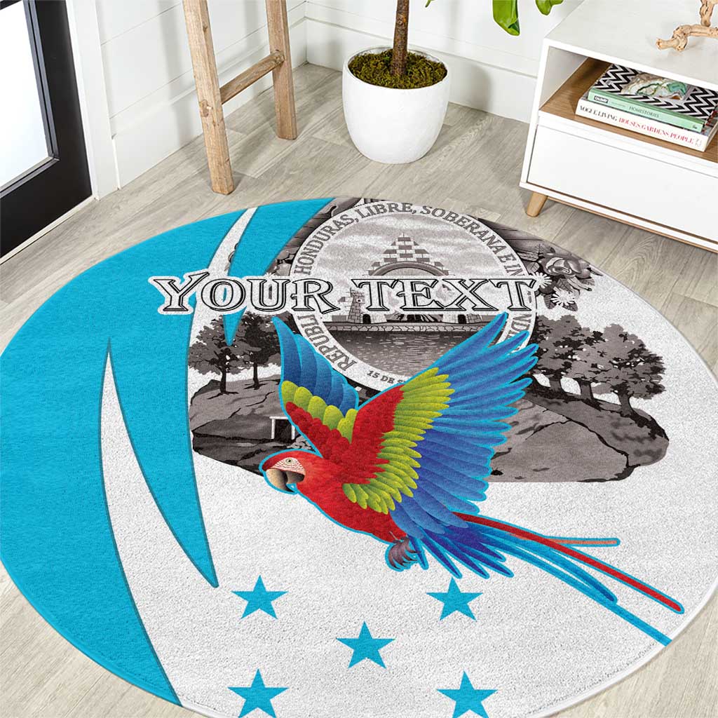 Personalized round area rug with scarlet macaw, blue stars, and crest graphic
