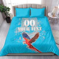 Blue duvet set with 2 pillowcases, scarlet macaw print and large “00” with custom text