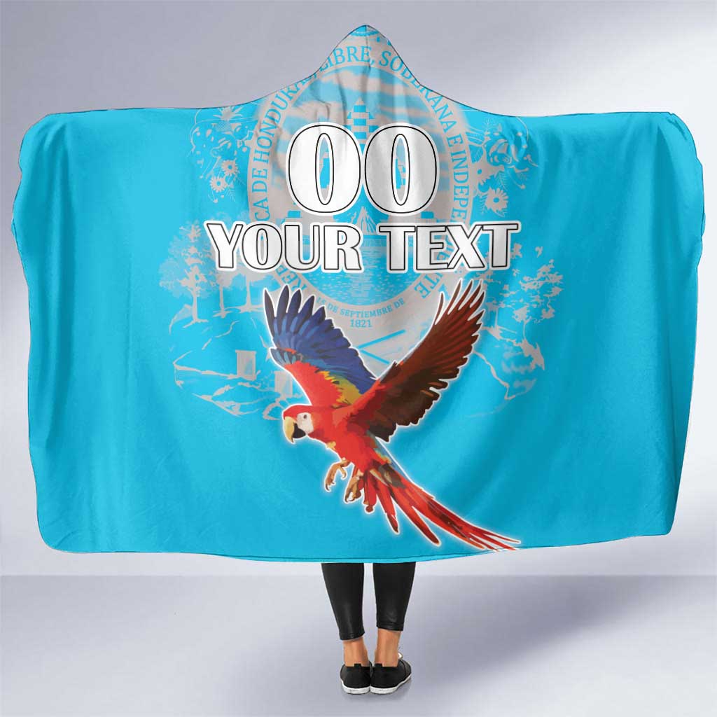 Blue hooded blanket with printed scarlet macaw and custom text design