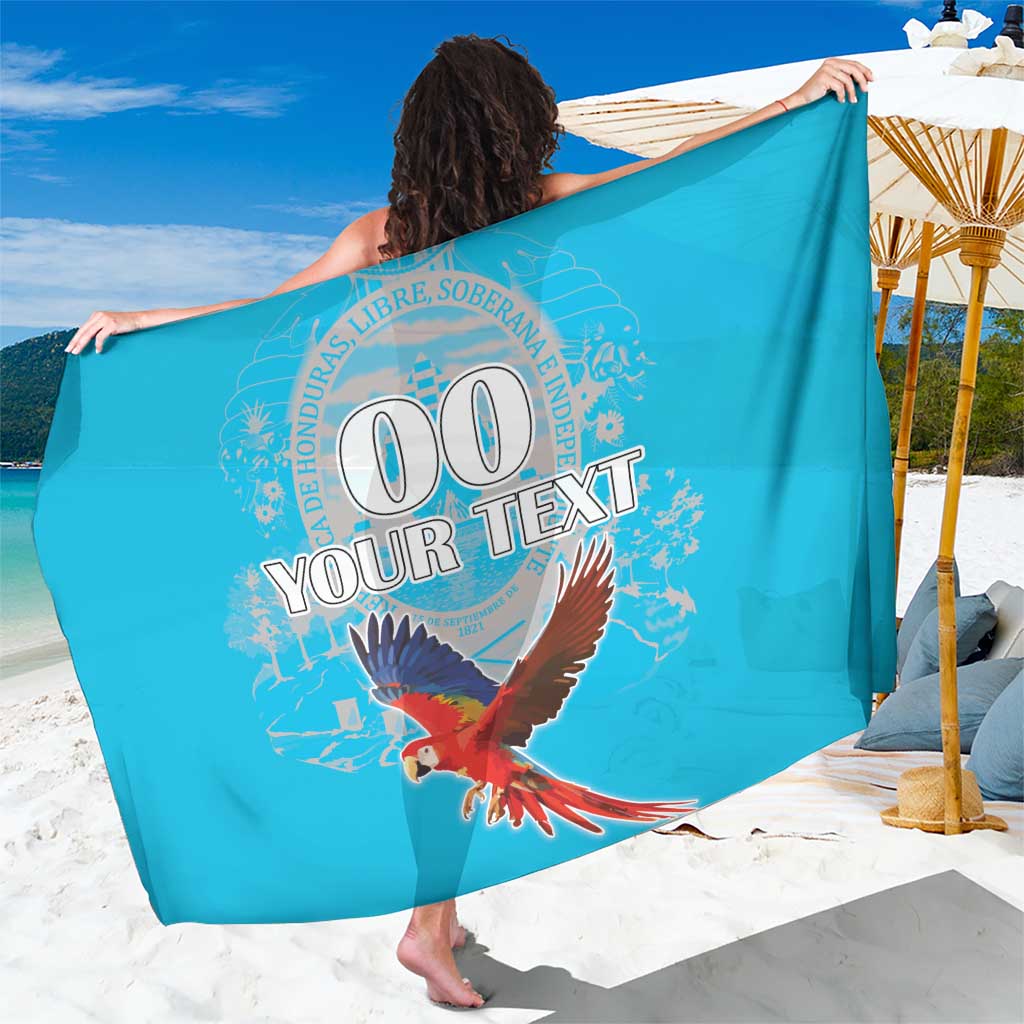 Blue sarong with red macaw and circular graphic, custom text area on fabric