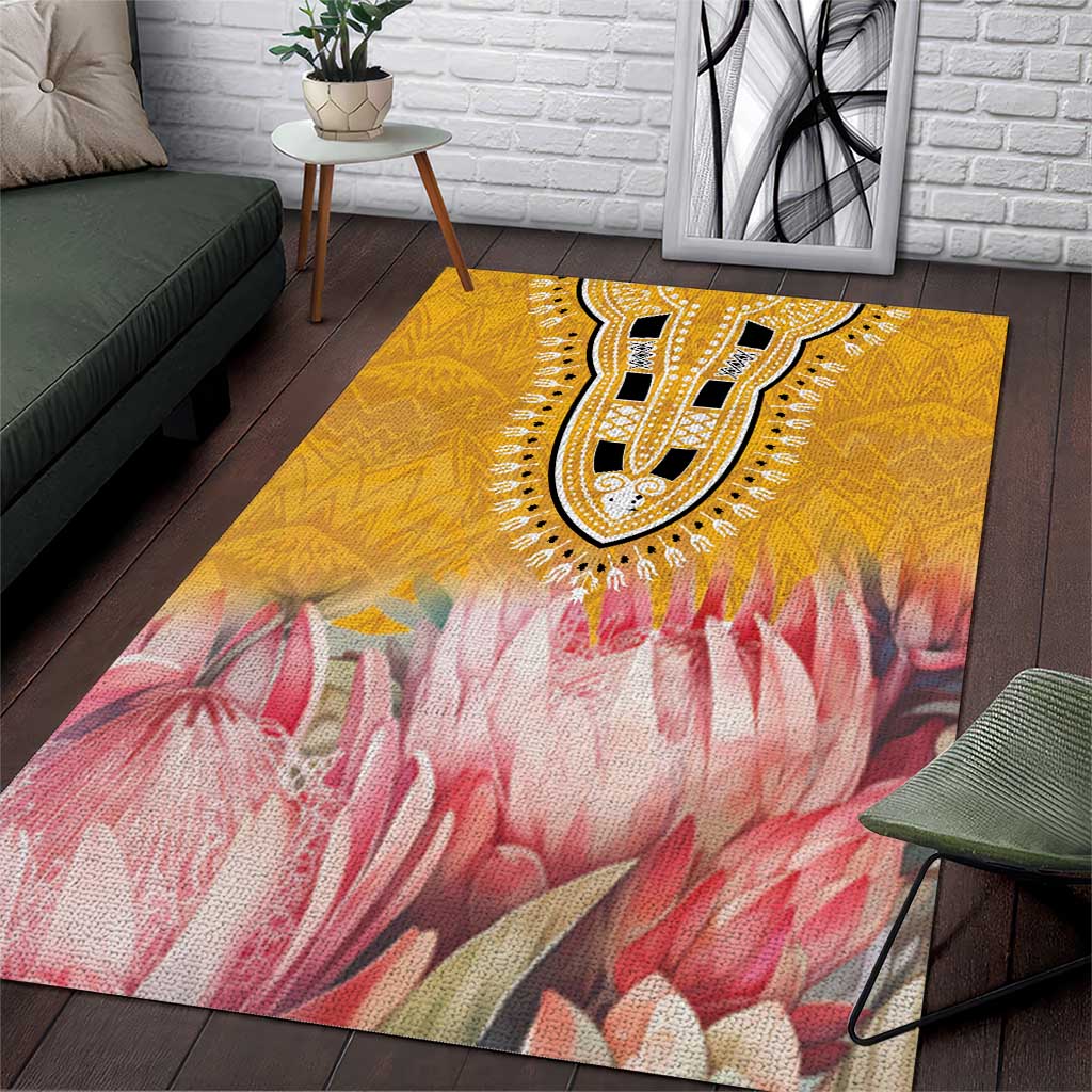 Yellow and pink floral area rug with prominent dark paisley medallion