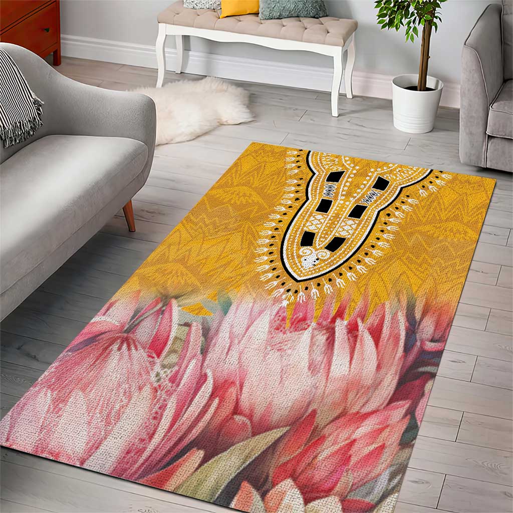 Yellow and pink floral area rug with dark paisley medallion at center