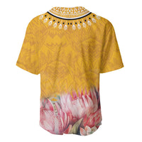 Yellow baseball-style jersey with patterned yoke and pink floral hem, short sleeves