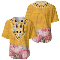 Yellow dashiki-style baseball jersey with black-and-white embroidered neckline and pink floral panel