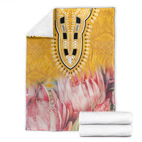 King-size blanket with yellow animal motif and pink protea floral design