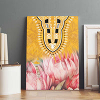 Yellow canvas wall art with bold tribal U-pattern and pink protea floral motif