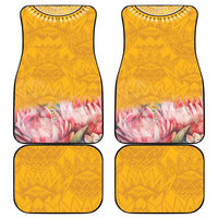 Yellow car floor mat set with geometric pattern and pink floral protea motif