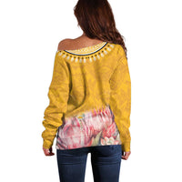 Yellow off-shoulder sweater with geometric back print and pink floral center panel