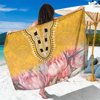 Yellow sarong with geometric dashiki shield medallion and pink flower print