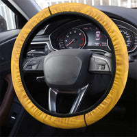 Yellow dash steering wheel cover with geometric pattern and black grip trim