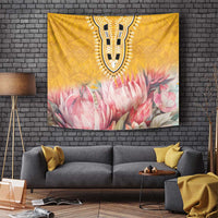 Yellow tapestry with black-and-gold neckline motif and pink protea flower cluster