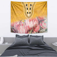 Yellow floral wall hanging with black tribal pattern and pink protea blooms