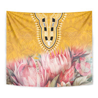 Close-up of yellow tapestry with black-and-gold motif and pink protea flower design