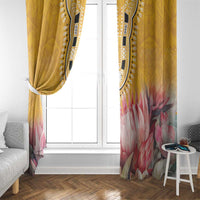 Pair of yellow window curtains with pink protea floral print and black dashiki trim
