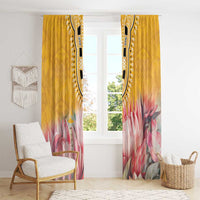 Yellow window curtains with pink protea floral print and black dashiki ornament at top