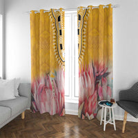 Yellow grommet-top curtains with pink protea floral print and black dashiki center trim