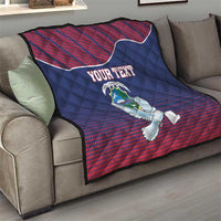 Personalized quilt blanket with Liberia dove and coat of arms, blue and red on living room sofa