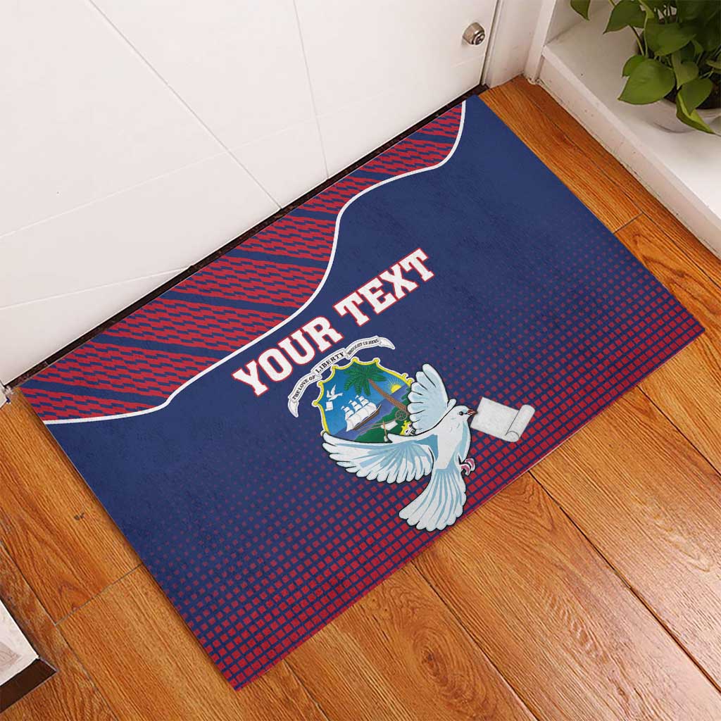 Blue personalized rubber doormat with white dove holding scroll and red patterned border