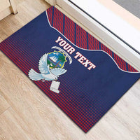 Blue rubber doormat with YOUR TEXT, white dove holding scroll and red patterned border