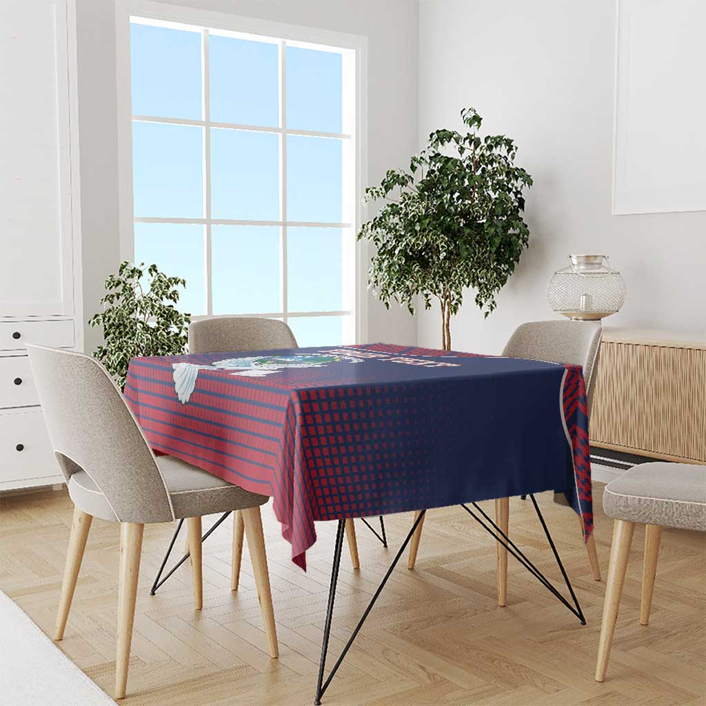 Navy and red patterned tablecloth with dove motif on dining table