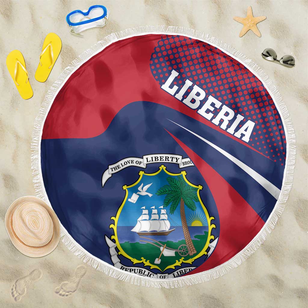 Red circular beach blanket with Liberia coat of arms and fringe trim