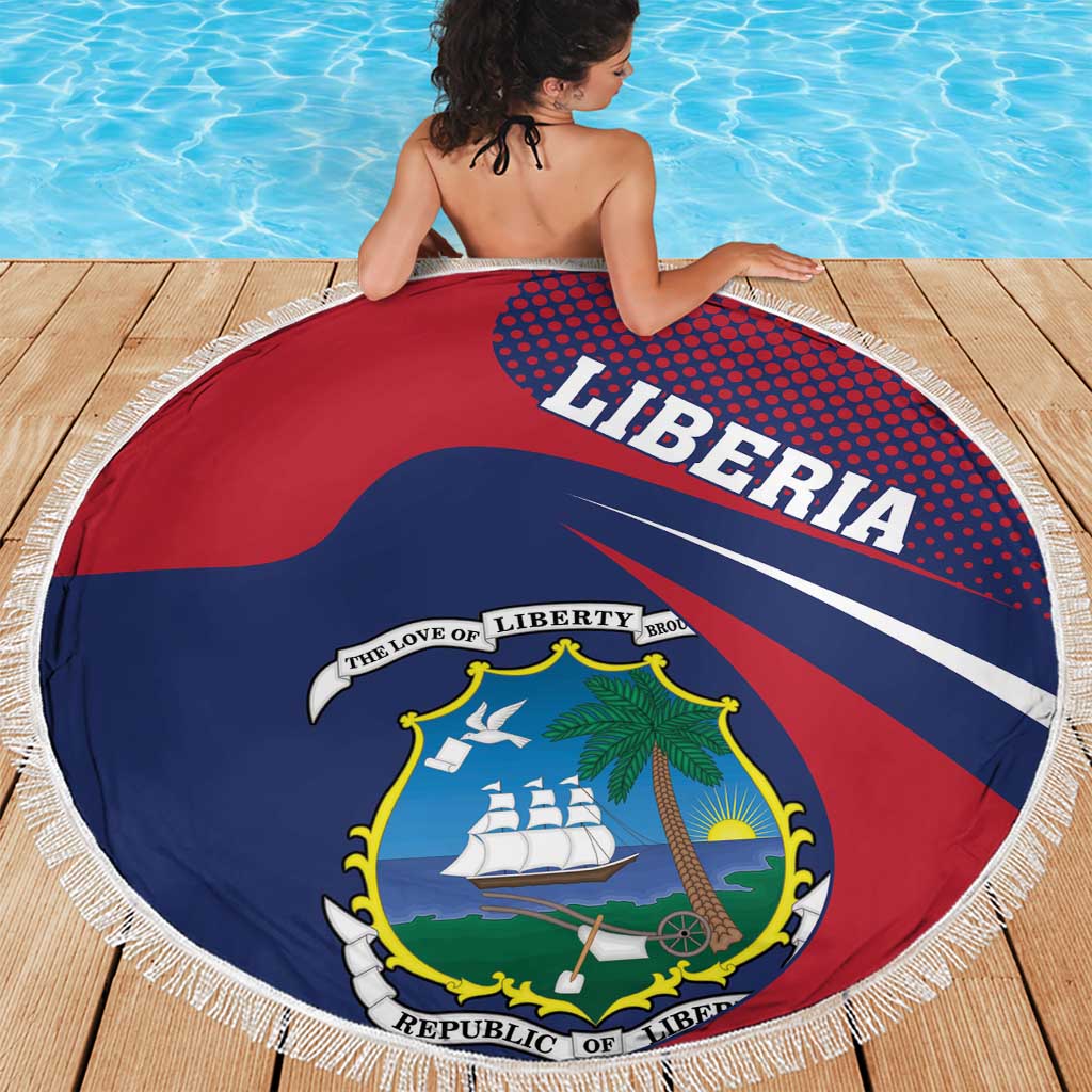 Red circular beach blanket with Liberia crest, wavy flag stripes, and fringe