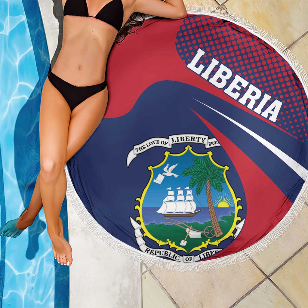 Red circular beach blanket with Liberia emblem, blue stripes, and white fringe
