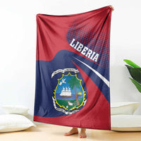 Red and navy Liberia blanket with centered coat of arms and LIBERIA lettering