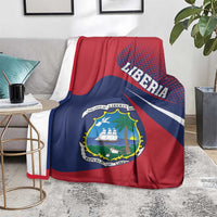 Red and navy Liberia blanket with LIBERIA lettering and coat-of-arms crest