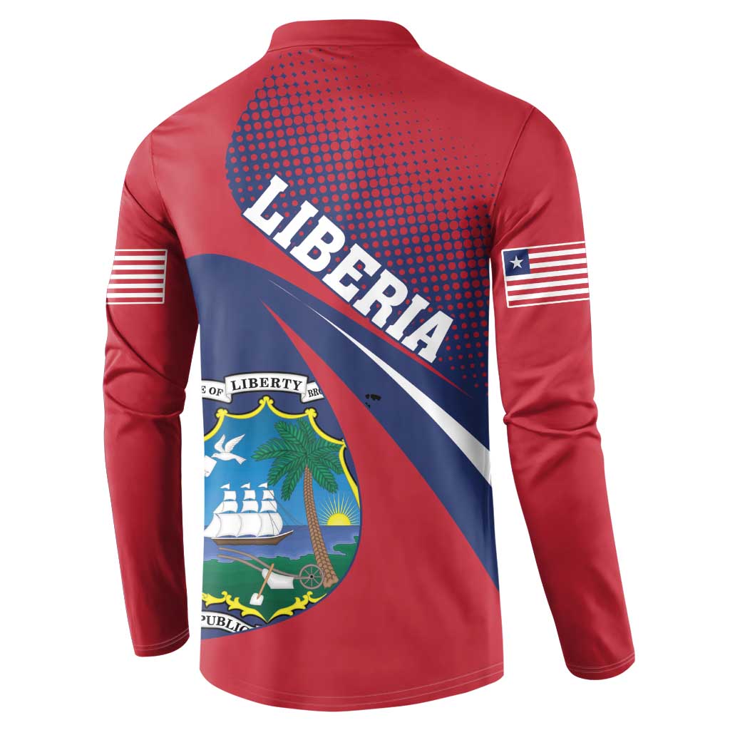 Red long-sleeve henley showing back crest, dotted pattern, and flag stripe on sleeves.