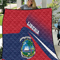 Liberia flag quilt held up outdoors: red-blue with Liberia lettering and coat of arms