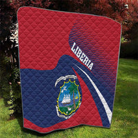 Liberia flag quilt, red and blue with Liberia text and coat of arms centered on quilted face