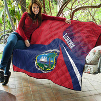 Liberia flag quilt draped by person, red and blue with coat of arms and Liberia lettering