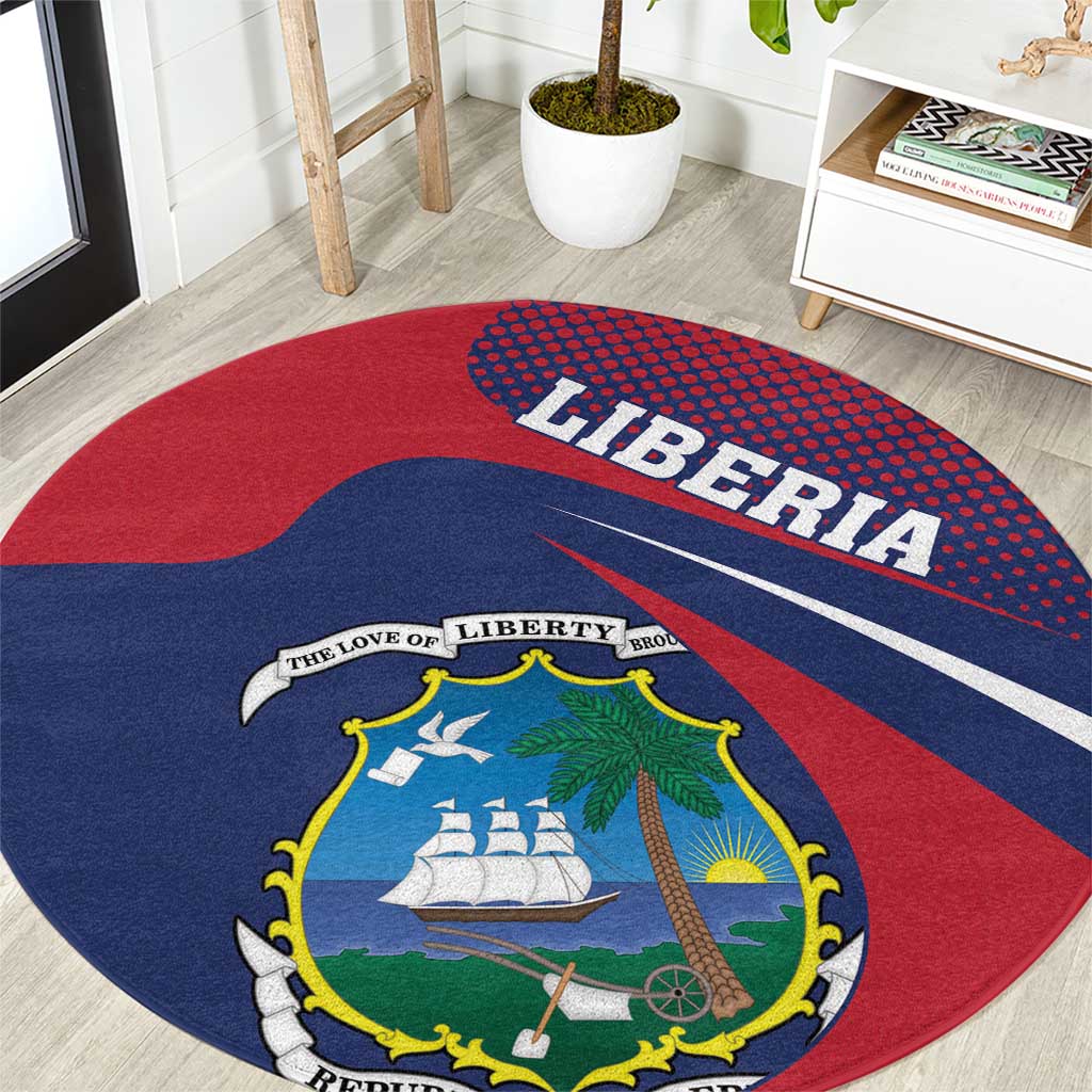 Red and navy round carpet close-up with 'LIBERIA' text and coat of arms shield graphic.