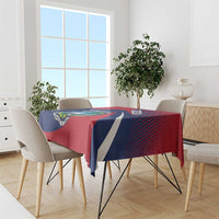 Liberia-themed tablecloth with red and navy blue panels and white stripe pattern on chairs